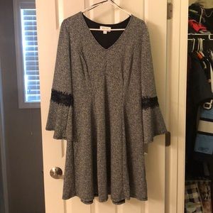 Black business casual dress with flared sleeve